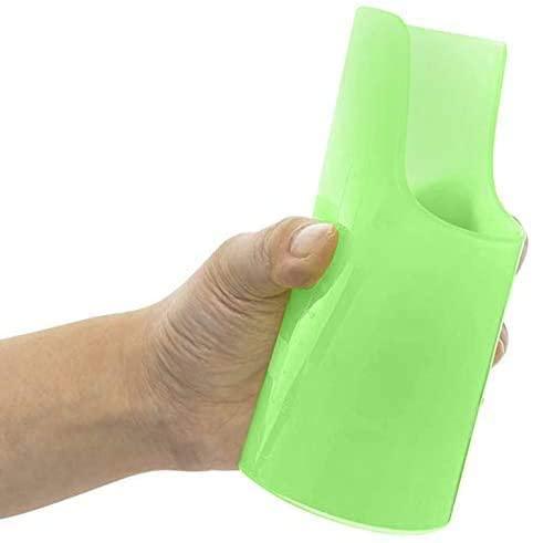 Hand holding a green sensory-friendly adaptive drinking cup for kids or adults
