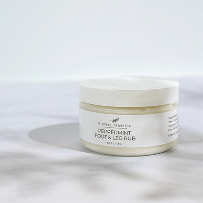 8 Sheep Organics peppermint foot and leg rub jar on white background, natural wellness balm