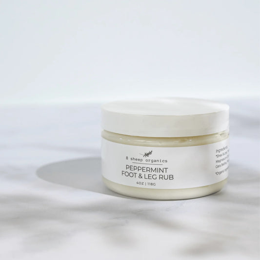 8 Sheep Organics peppermint foot and leg rub jar on white background, natural wellness balm