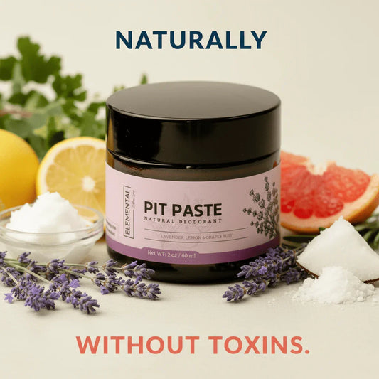 Natural deodorant pit paste jar with lavender, lemon, grapefruit, and coconut on table