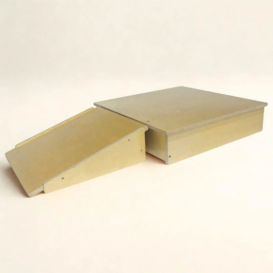 Wooden Pikler platform and ramp set for baby motor skill development on neutral background
