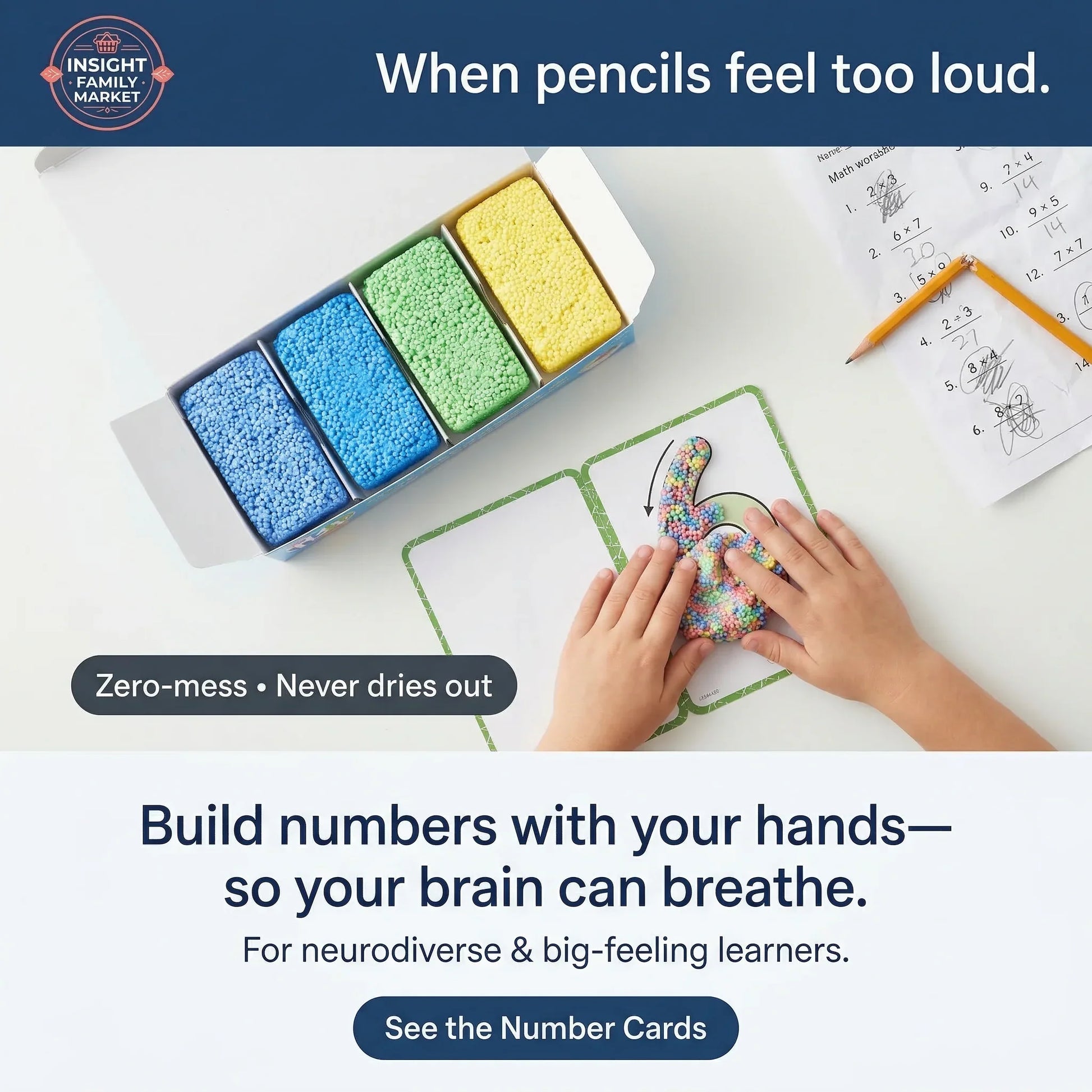 Children's hands interacting with colorful number cards and a container of sand on a table.
