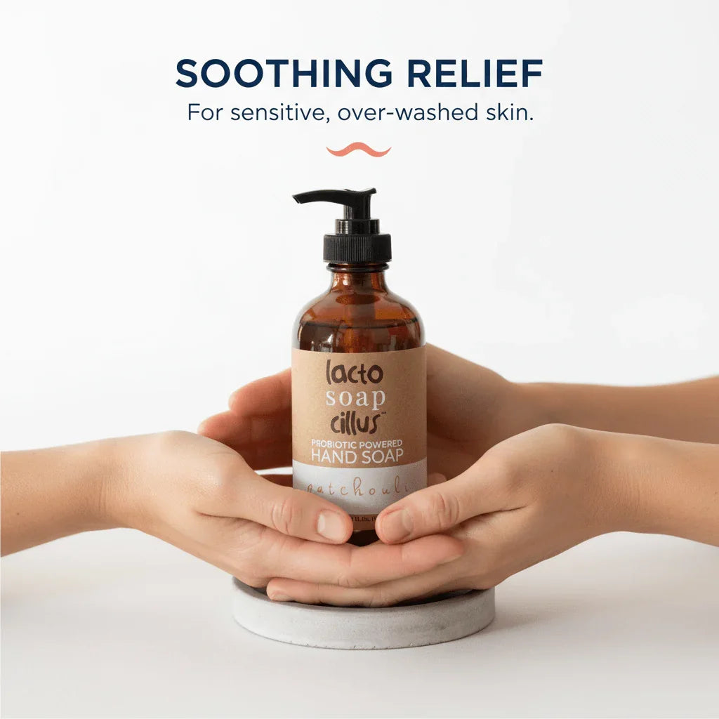 Hands holding a probiotic powered hand soap bottle for sensitive skin