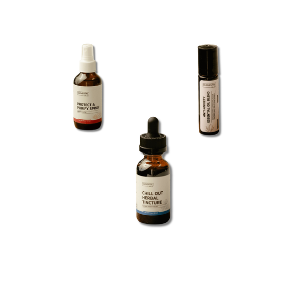 Three bottles of natural products on a white background