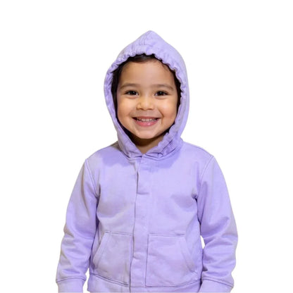 Smiling child in a lavender sensory-friendly hoodie with front pockets on white background