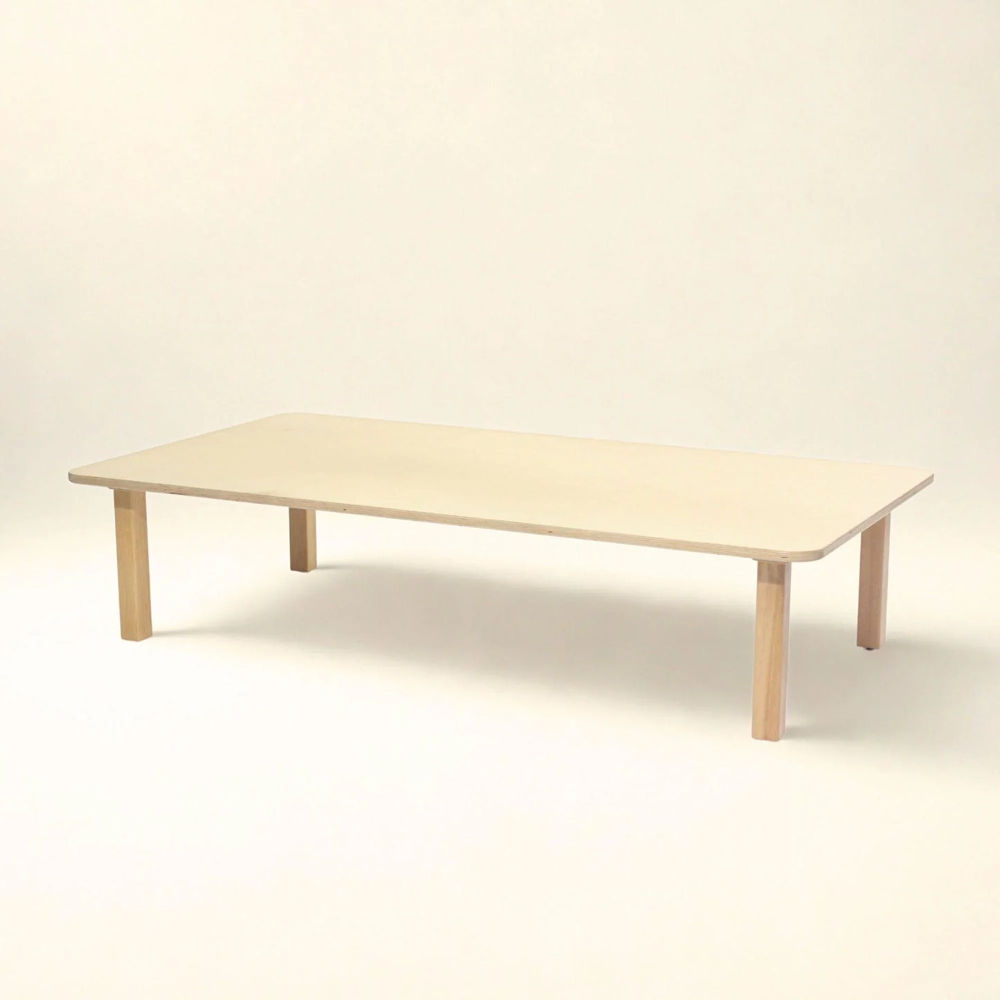 Rectangle toddler table with rounded edges and light wood finish, sensory-friendly furniture
