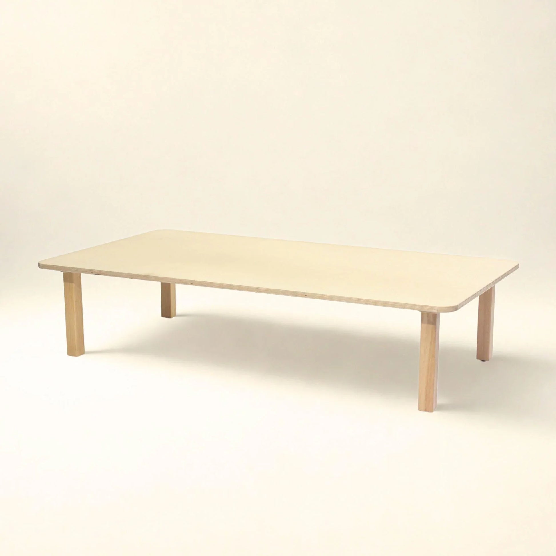 Rectangle toddler table with rounded edges and light wood finish, sensory-friendly furniture