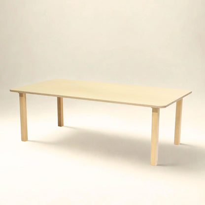 Rectangular wooden preschool table with rounded corners, light natural finish