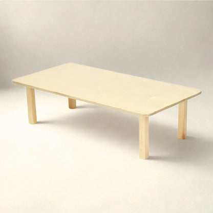 Rectangle wooden toddler table with rounded corners on a neutral background