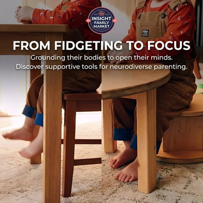 Child in sensory-friendly overalls at a wooden table, highlighting focus and neurodiverse support