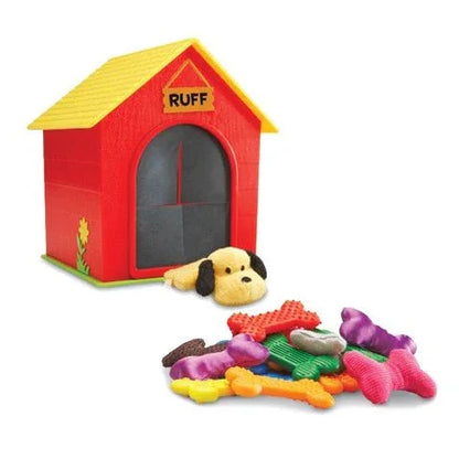 Doghouse toy set with plush puppy and colorful textured dog toys for sensory play