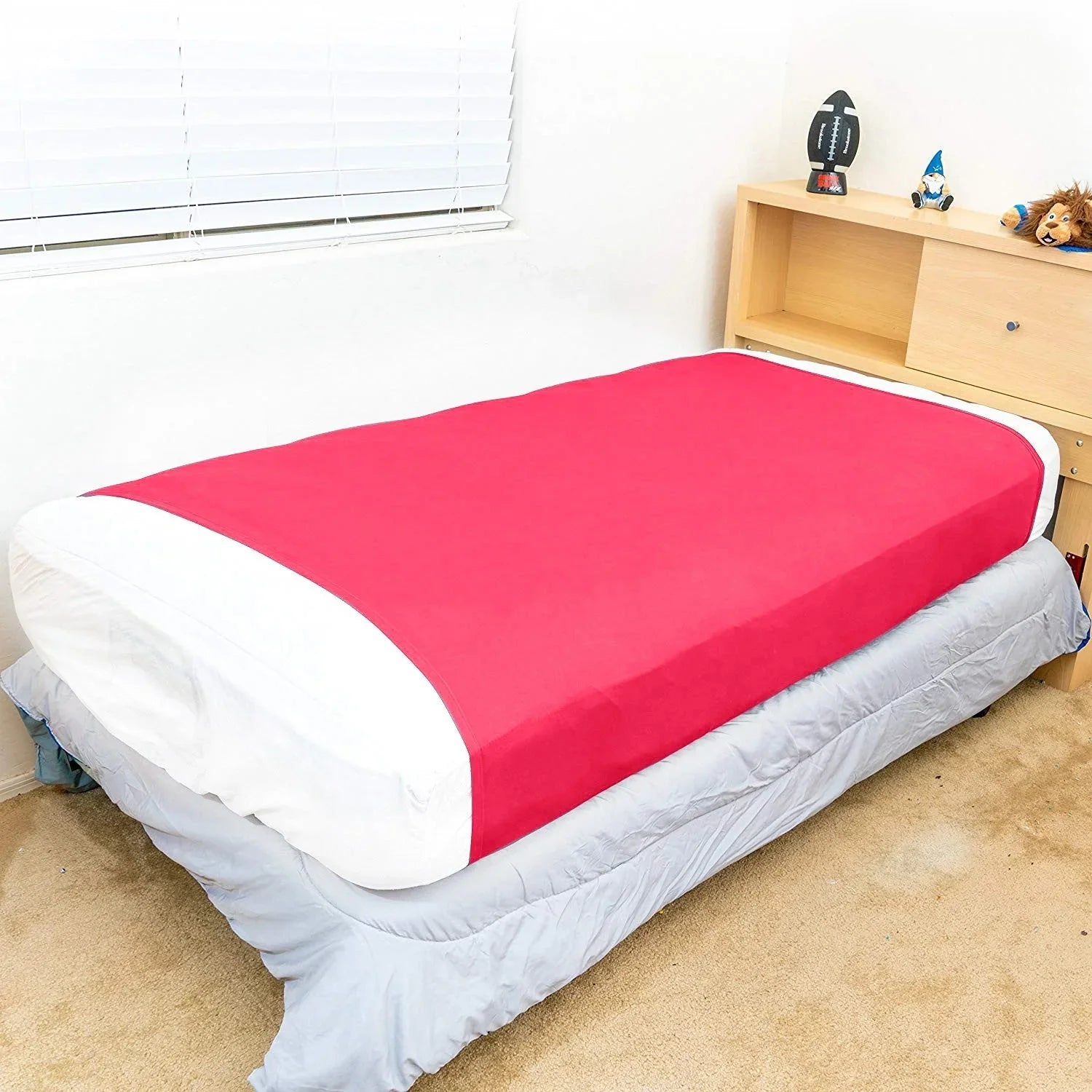Red sensory bed sheet for kids on twin bed, designed for sensory support