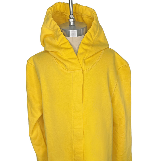 Front view of a sensory-friendly yellow hoodie on a mannequin.