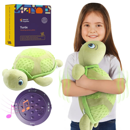 Child hugging plush green turtle vibrating sensory pillow, packaging and sound device shown
