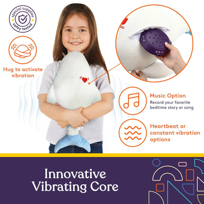 Child hugging a vibrating sensory plush shark toy for calming and sensory support