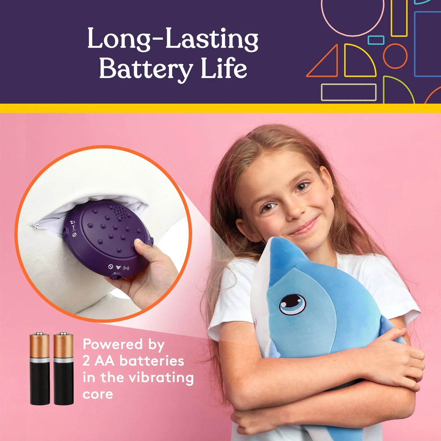 Smiling child hugging a blue sensory shark plush with long-lasting battery-powered vibrating core