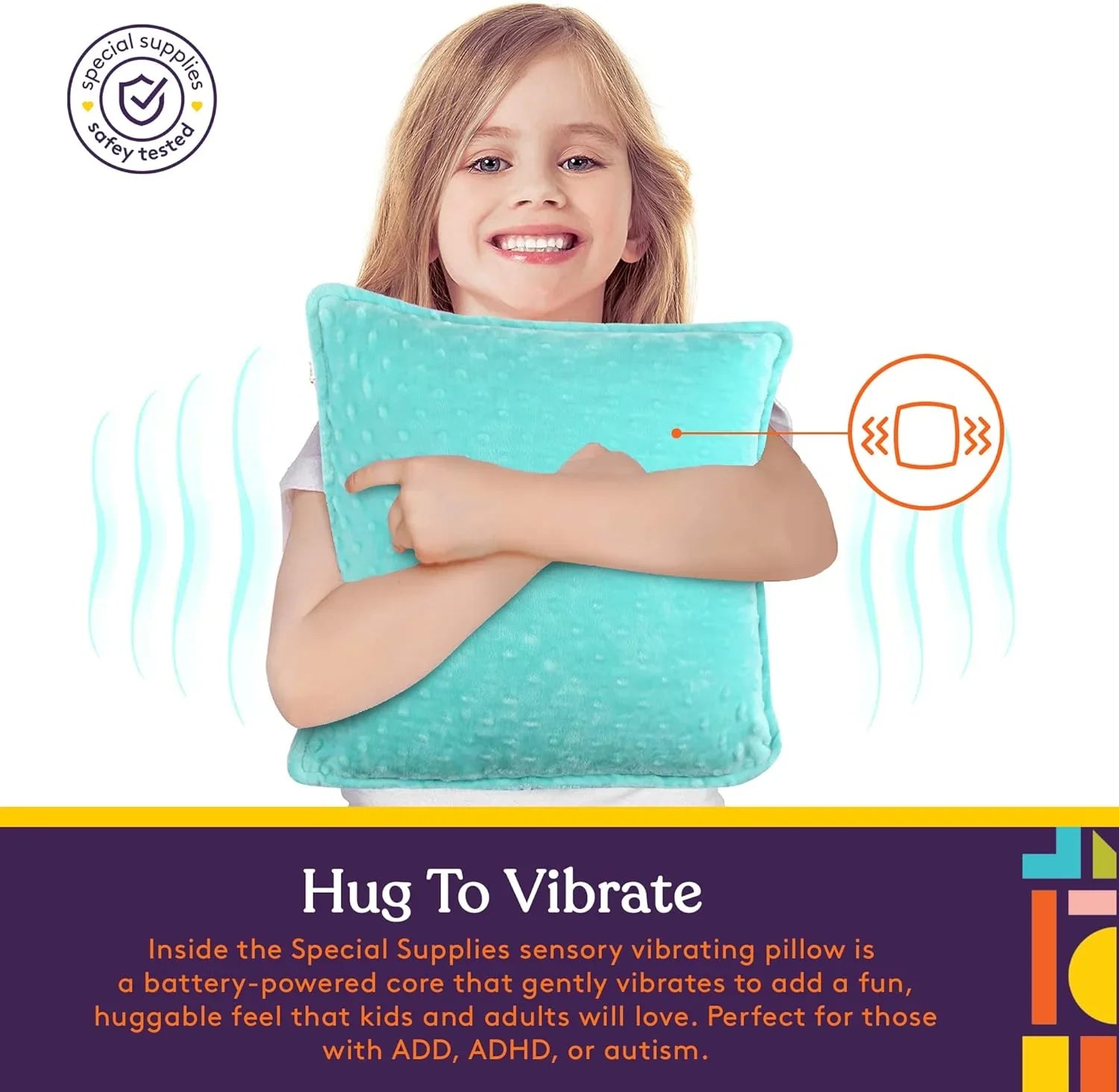 Smiling child hugging a blue sensory vibrating pillow designed for sensory support and comfort