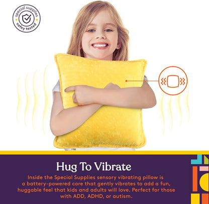 Child hugging yellow sensory vibrating pillow for autism, ADHD, and sensory needs support.