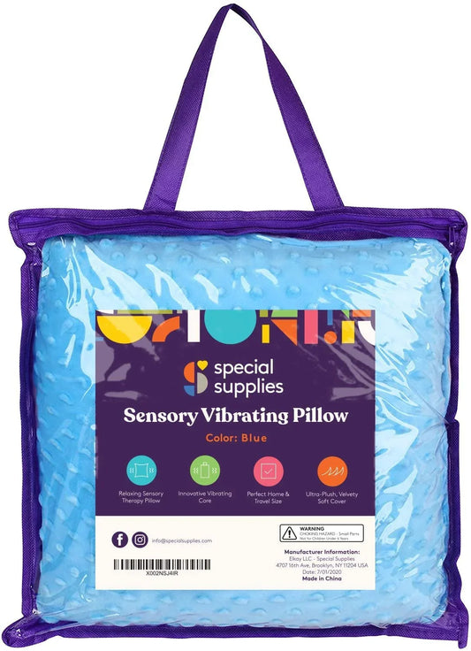 Blue sensory vibrating pillow in a clear purple carrying case, packaged for sensory therapy support.