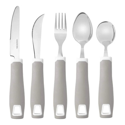 Gray adaptive utensil set with ergonomic handles, including knives, fork, spoon and teaspoon