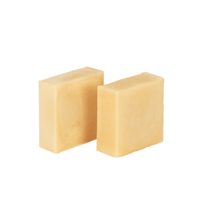 Natural shampoo bar with probiotics and essential oils, two beige solid bars