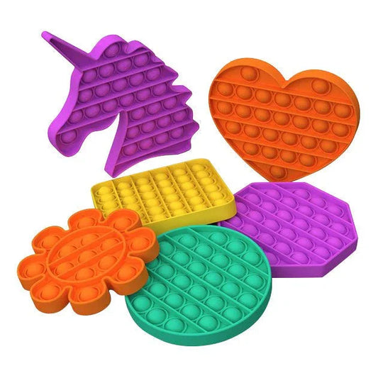 Colorful silicone sensory fidget pop toys in unicorn, heart, and geometric shapes