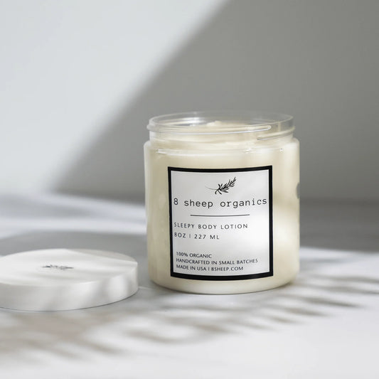 8 Sheep Organics Sleepy Body Lotion jar on a white surface, organic skincare product