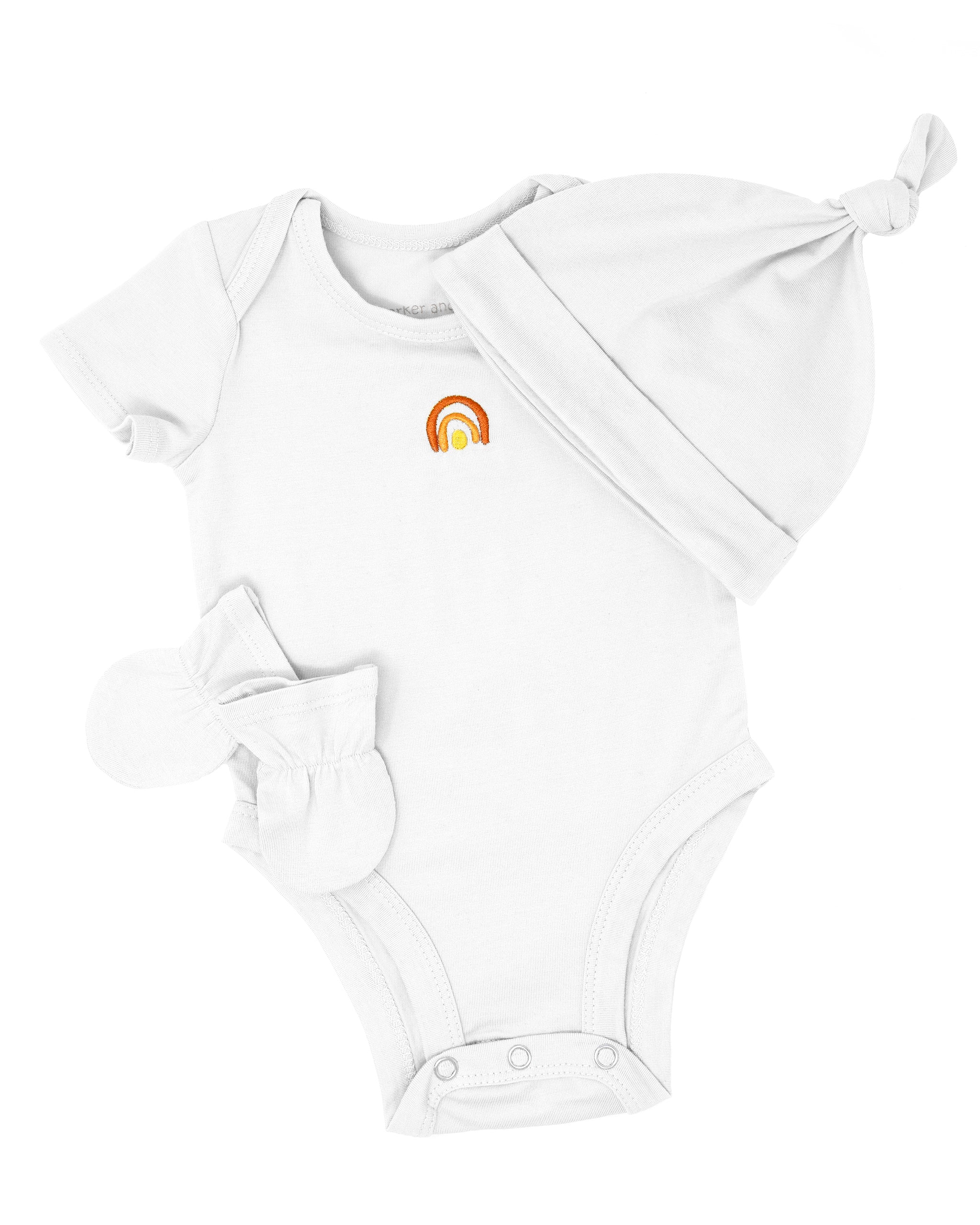 White baby outfit with a logo on a white background