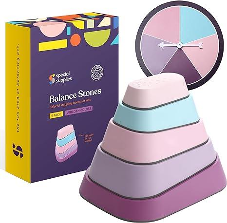 Stacked pastel sensory balance stones for kids with box and spinner, unicorn colors set