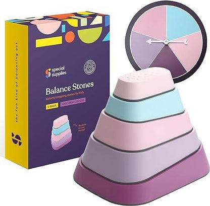 Stacked pastel sensory balance stones for kids with box and spinner, unicorn colors set
