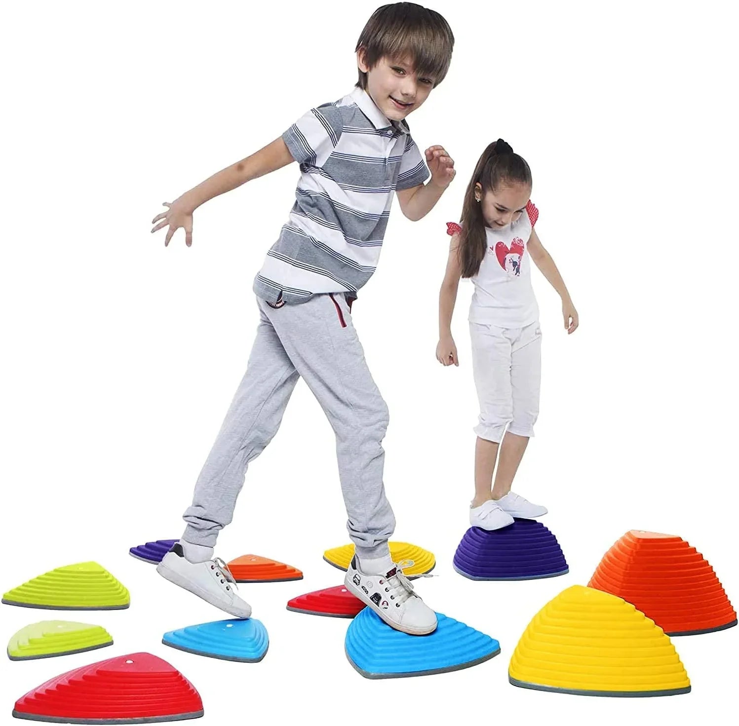 Kids balancing on colorful sensory stepping stones for gross motor skills and sensory play