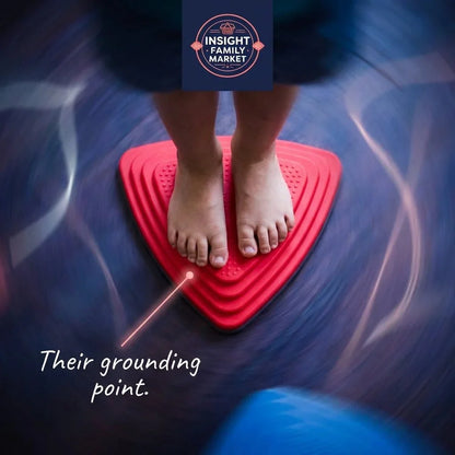 Child's bare feet on red sensory balance pad for grounding and sensory support