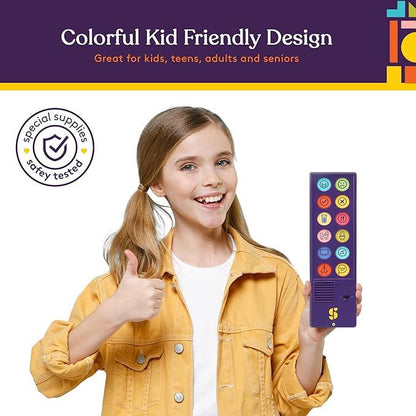 Smiling child holding colorful sensory communication device, giving thumbs up
