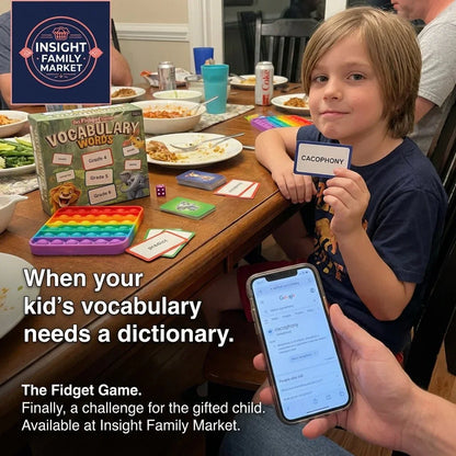Gifted child holding vocabulary card for 'cacophony' at dinner table with educational game, sensory fidget toy, and phone showing word definition.