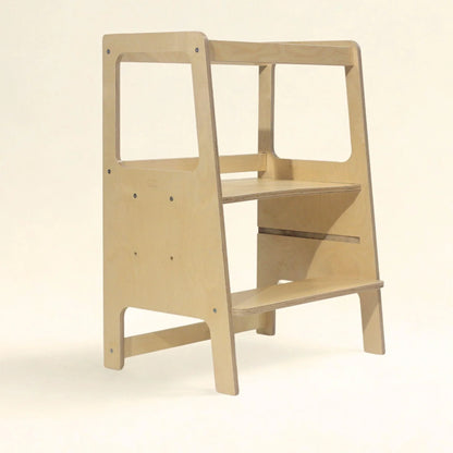 Wooden toddler learning tower with double steps and safety rails for kitchen or playroom use
