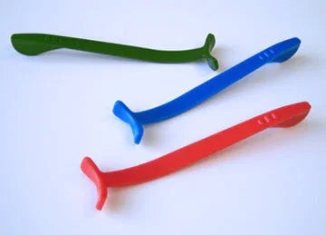 Three colorful tongue lifters for oral motor therapy, shown in green, blue, and red.