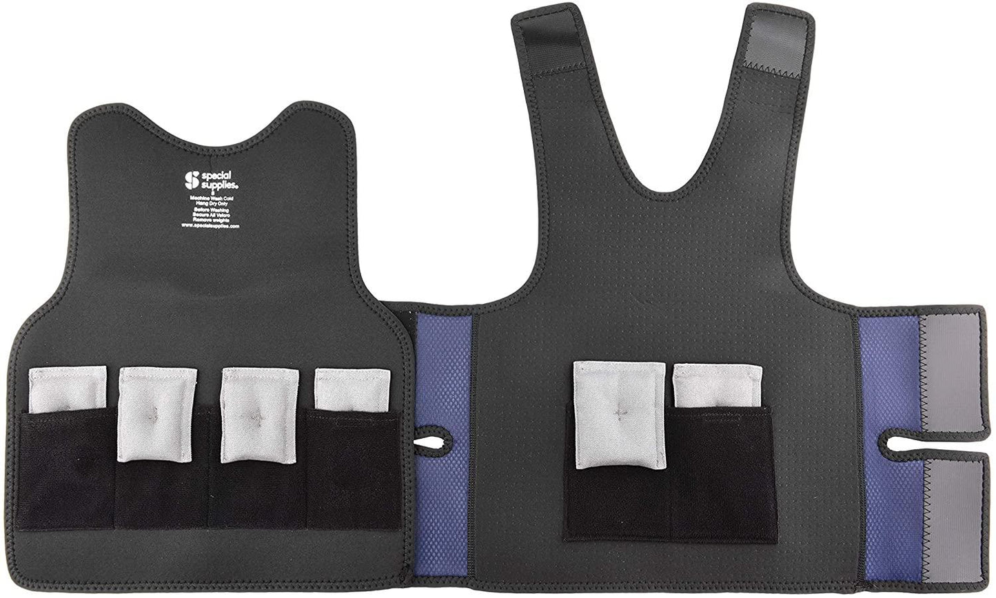 Black sensory weighted vest laid flat with removable weight pouches in visible pockets