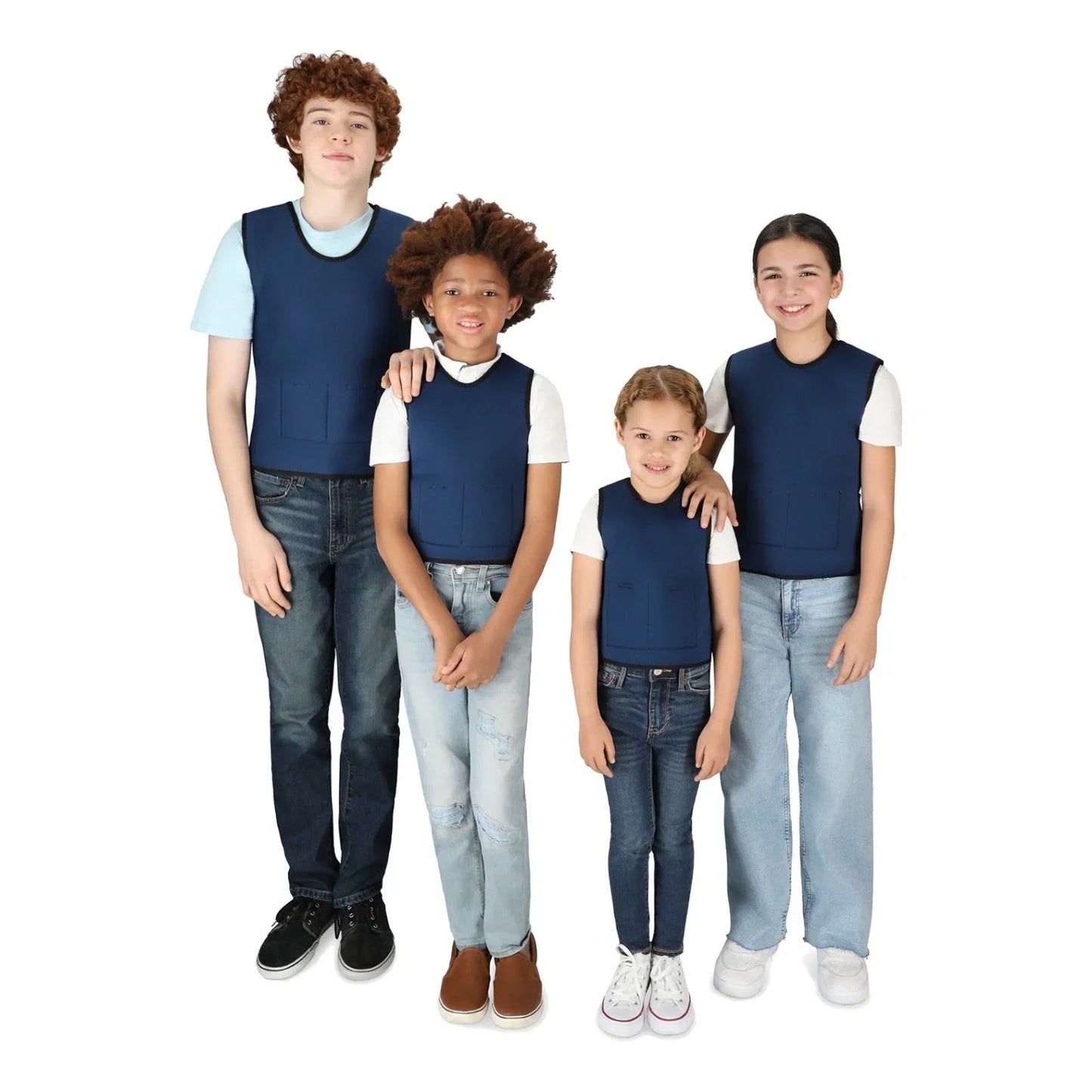 Four children wearing blue sensory compression vests over white shirts, standing together