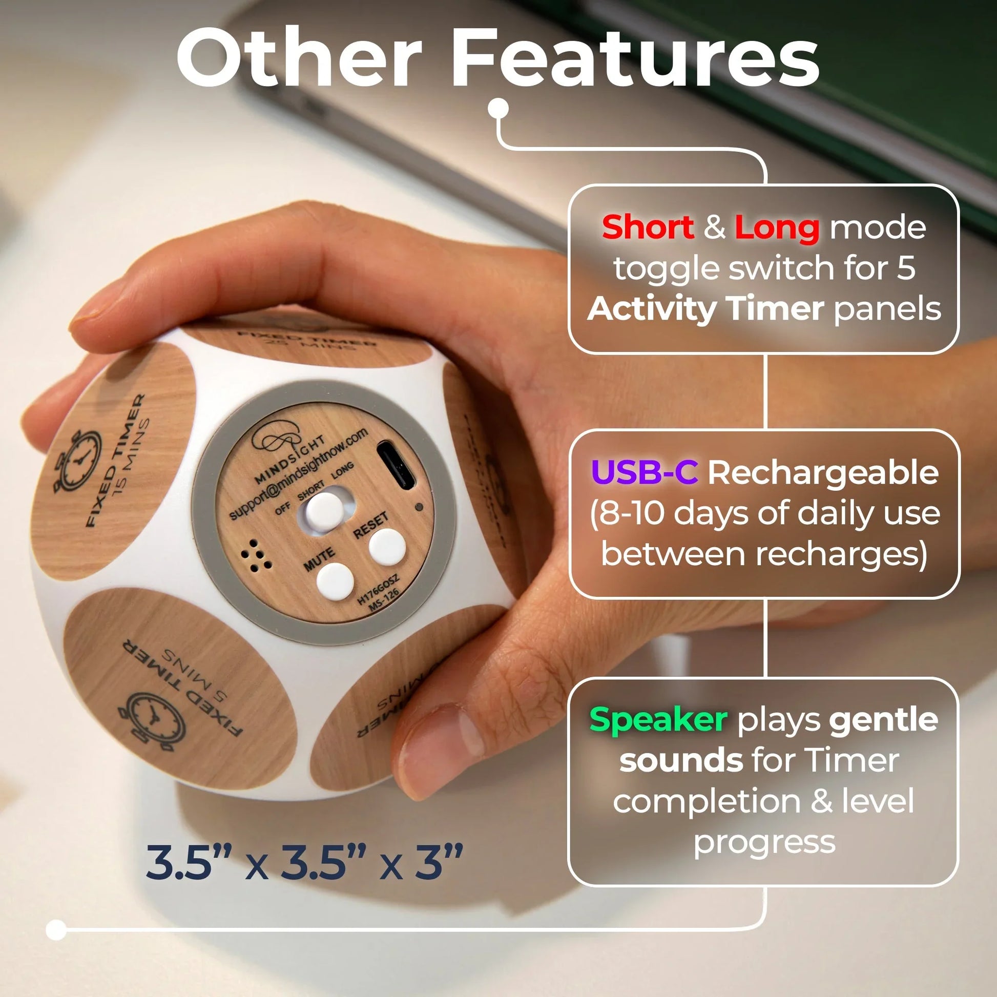 Hand holding a cube-shaped wellness timer with wood design, USB-C port, buttons, and feature labels