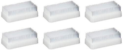 Set of six white handheld sensory brushes for tactile stimulation therapy